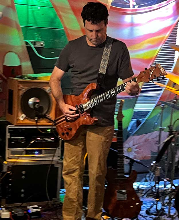 Eric Jones playing guitar